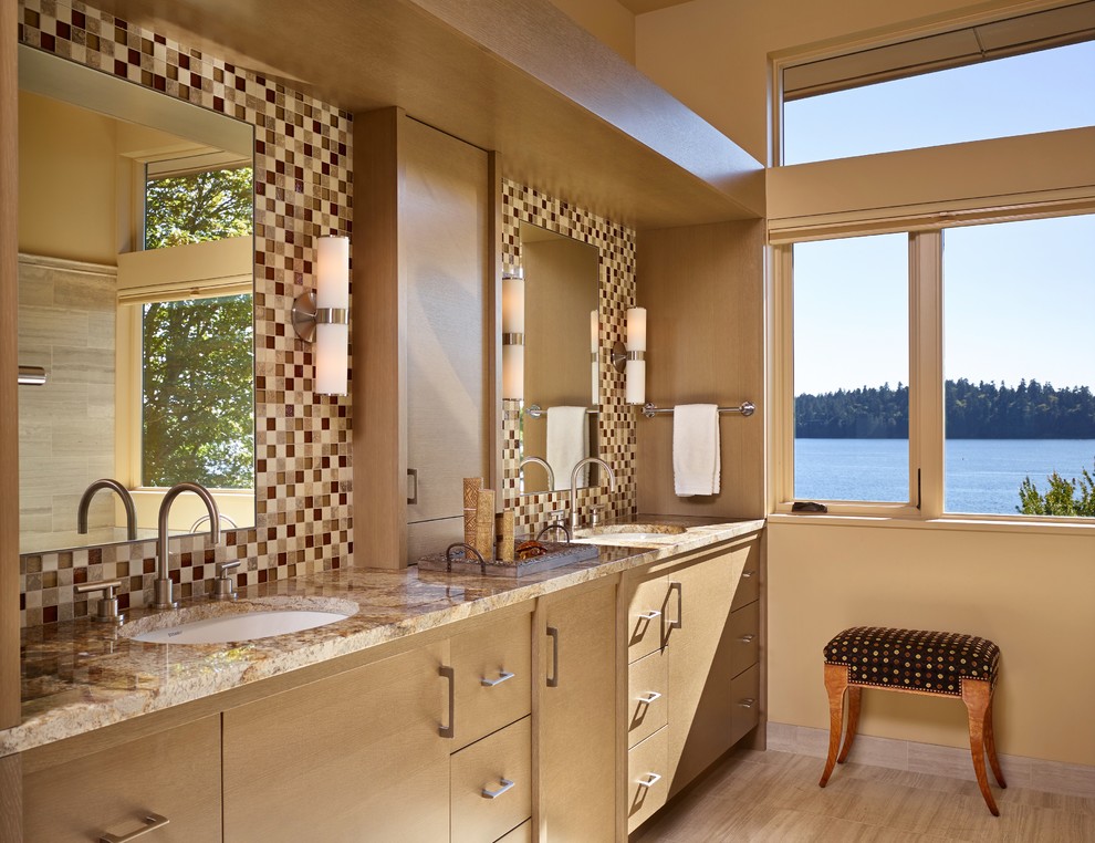 Photo of a contemporary master bathroom in Seattle with brown tile.