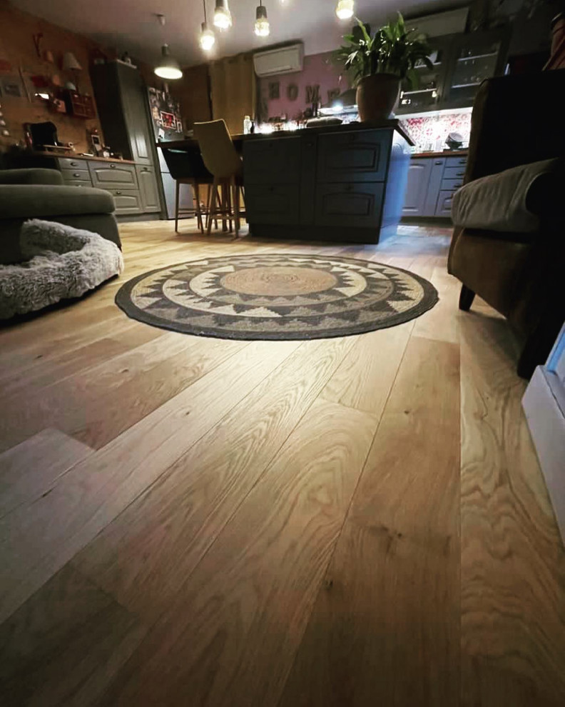 Dépose d’un ancien parquet flottant et pose d’un nouveau parquet collé en chêne.