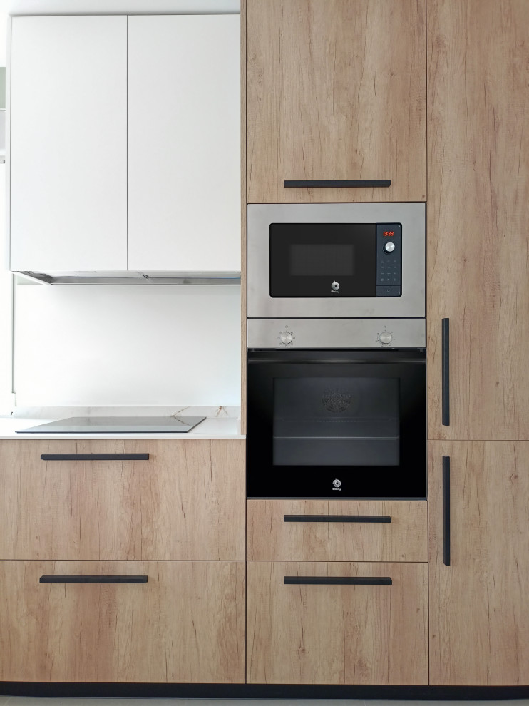 Madera, negro y verde suave: el nuevo lenguaje de este hogar