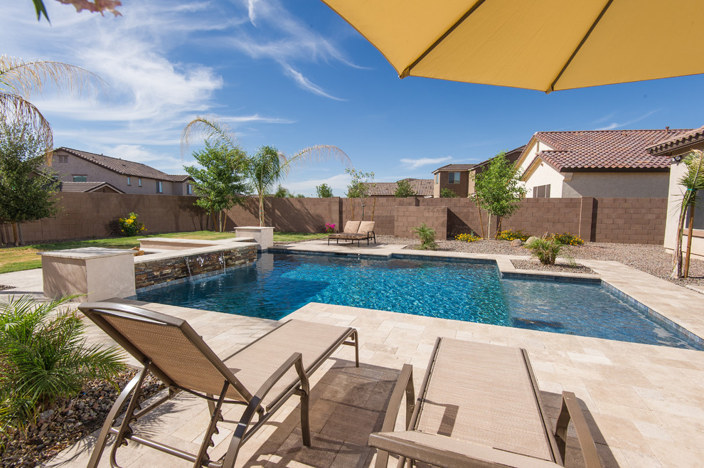 Photo of a contemporary custom-shaped pool in Phoenix.