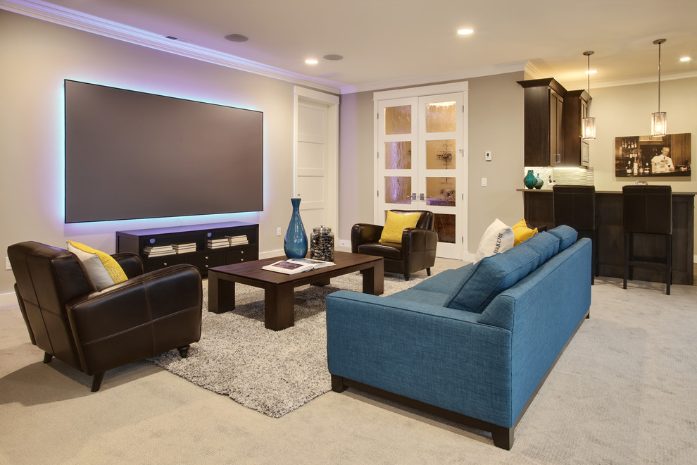 Inspiration for an arts and crafts open concept home theatre in Seattle with beige walls, carpet, a wall-mounted tv and beige floor.