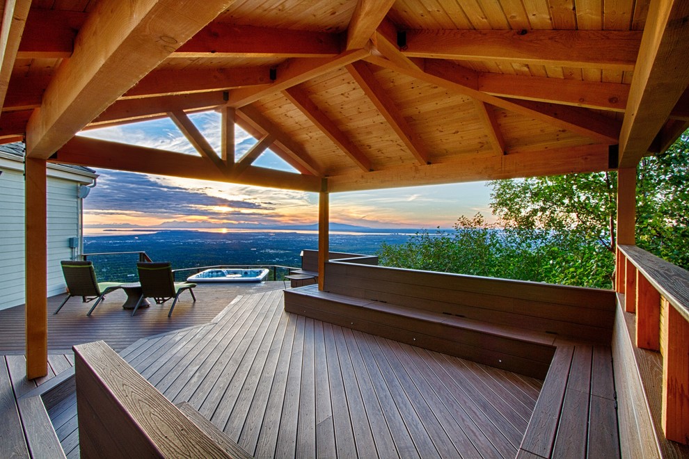 Custom craftsman deck with built-in benches and cable railing
