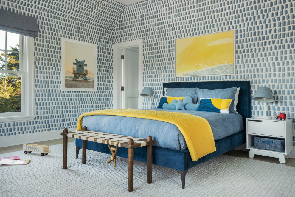 Inspiration for a beach style kids' bedroom for kids 4-10 years old and boys in New York with multi-coloured walls, medium hardwood floors, brown floor and wallpaper.