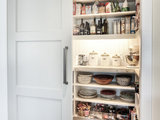 Transitional Kitchen by Dwellings Design Group