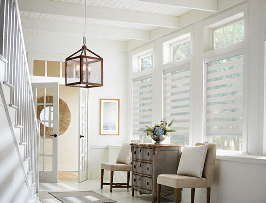 Hallway - mid-sized transitional ceramic tile and white floor hallway idea with white walls