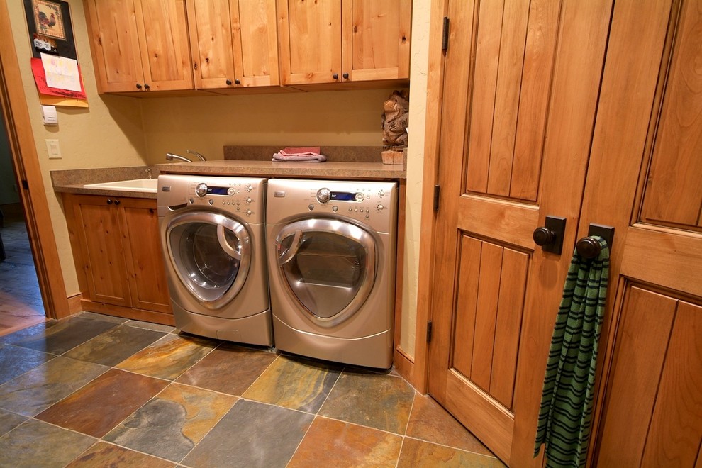 Inspiration for a country laundry room in Denver.