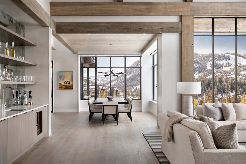 Dining room - rustic medium tone wood floor and wood ceiling dining room idea with white walls