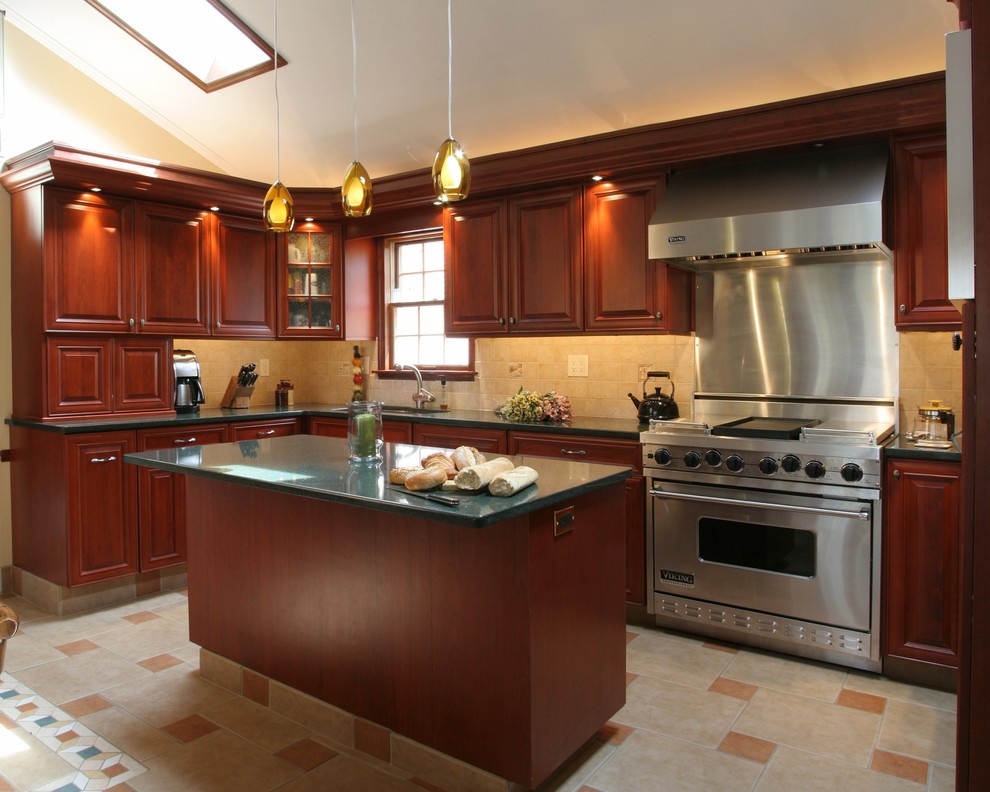 Eat-in kitchen - transitional l-shaped ceramic tile and beige floor eat-in kitchen idea with a drop-in sink, raised-panel cabinets, medium tone wood cabinets, quartz countertops, beige backsplash, mosaic tile backsplash, stainless steel appliances and an island