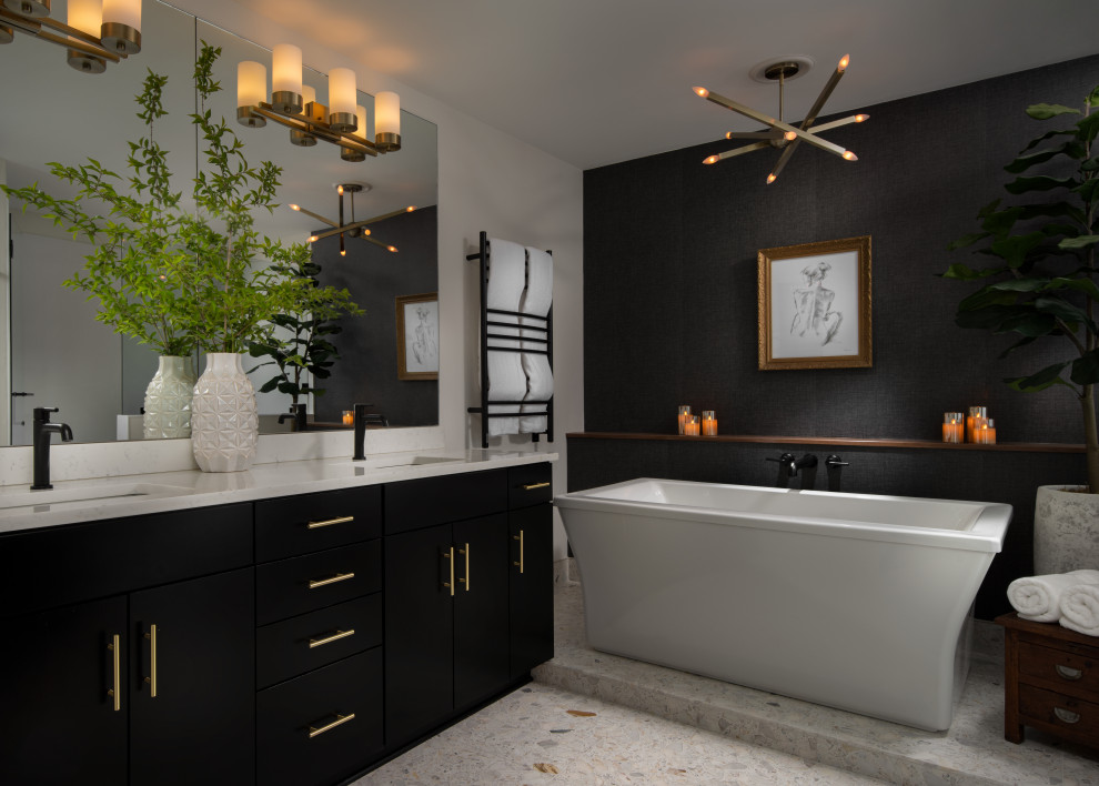 Design ideas for a large contemporary master bathroom in Kansas City with flat-panel cabinets, black cabinets, a freestanding tub, an alcove shower, terrazzo floors, engineered quartz benchtops, white floor, a hinged shower door, white benchtops, a shower seat, a double vanity and a built-in vanity.