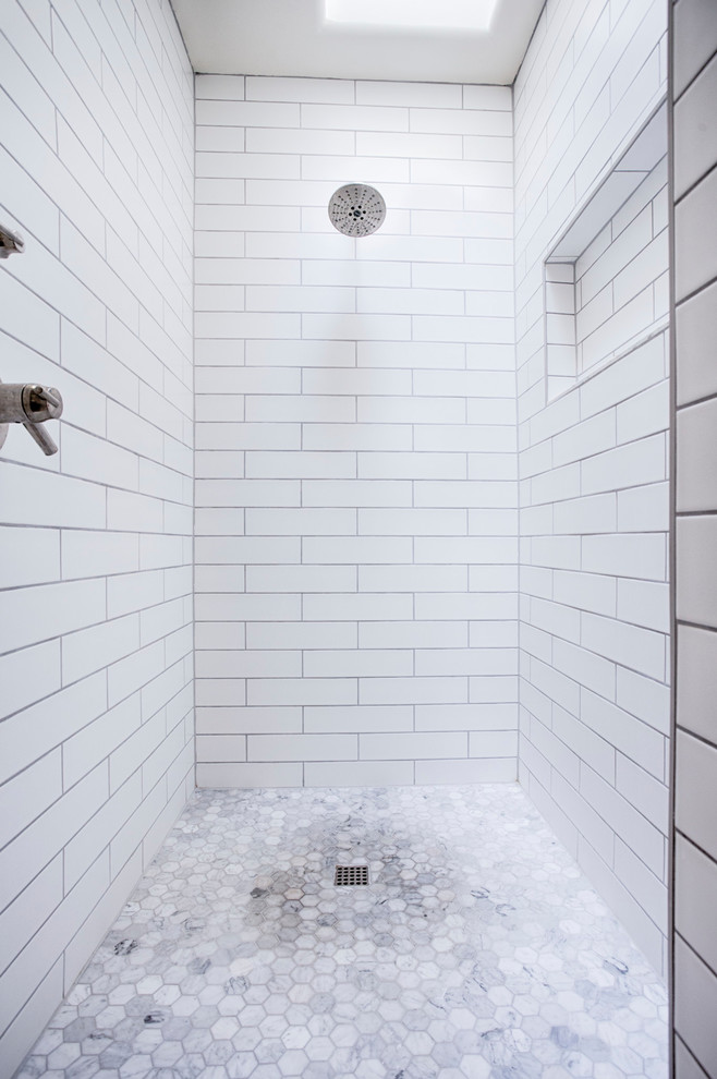 Freestanding bathtub - huge transitional master brown tile and porcelain tile porcelain tile freestanding bathtub idea in Phoenix with shaker cabinets, white cabinets, a two-piece toilet, gray walls, an undermount sink and quartzite countertops