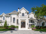 Mediterranean Exterior by Diamond Custom Homes, Inc.