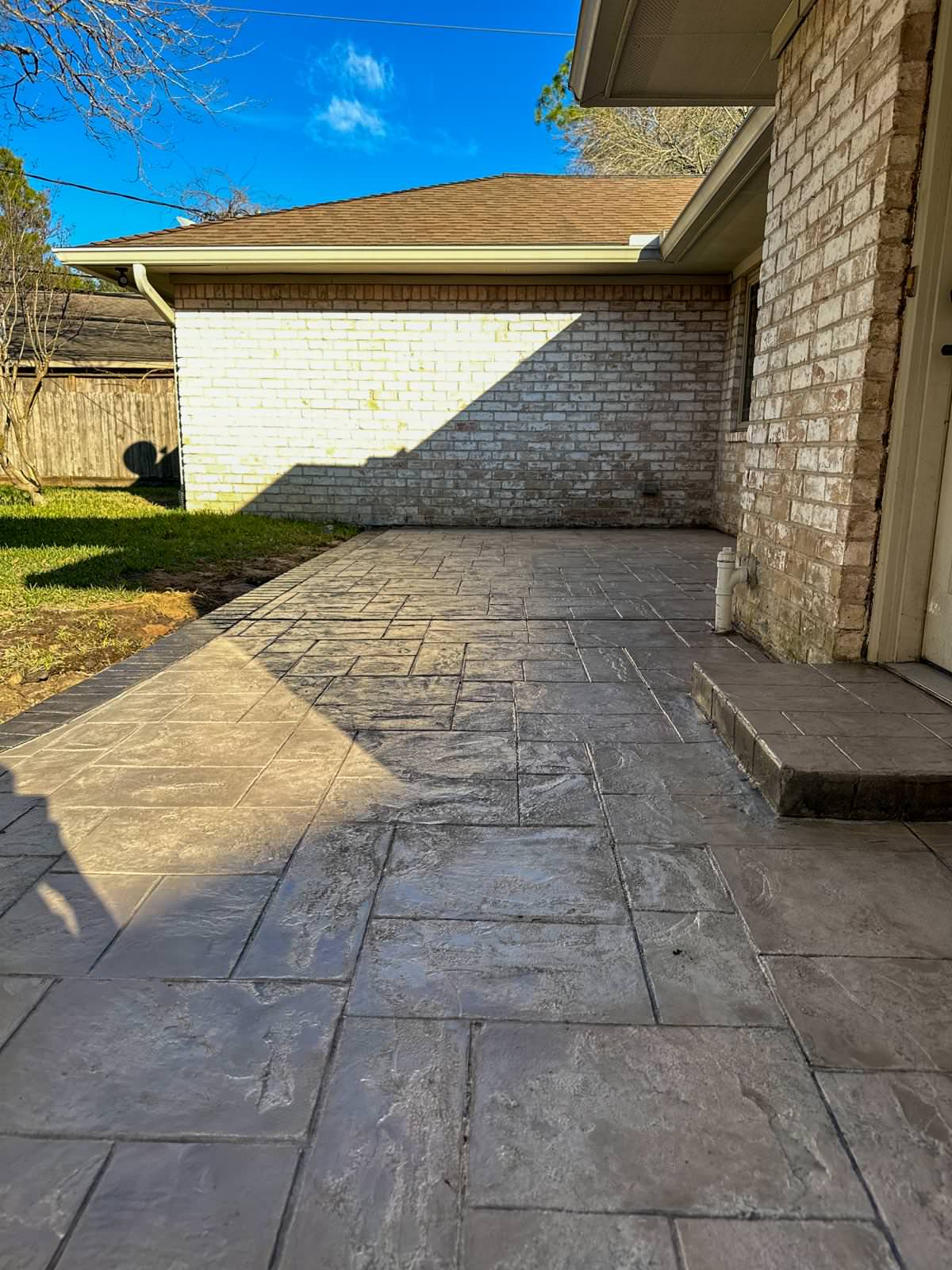 New driveway with sidewalks and stamped concrete!