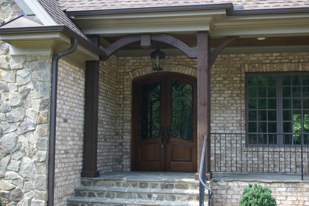 Example of a mountain style home design design in Raleigh