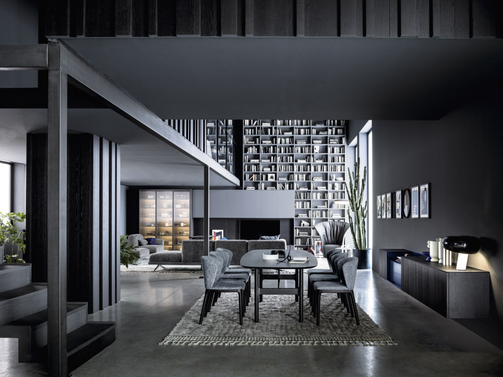 Immagine di un grande soggiorno minimalista stile loft con parquet chiaro, camino sospeso, TV a parete e carta da parati