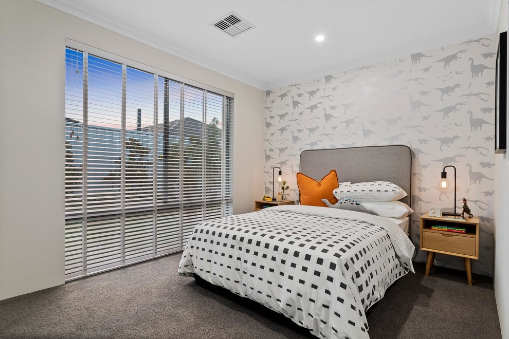 Contemporary kids' bedroom in Perth with beige walls and carpet for kids 4-10 years old and boys.