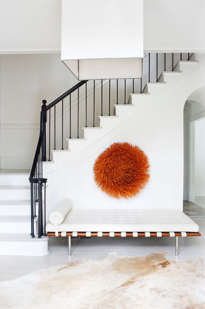 Inspiration for a transitional painted wood l-shaped staircase in Atlanta with painted wood risers.