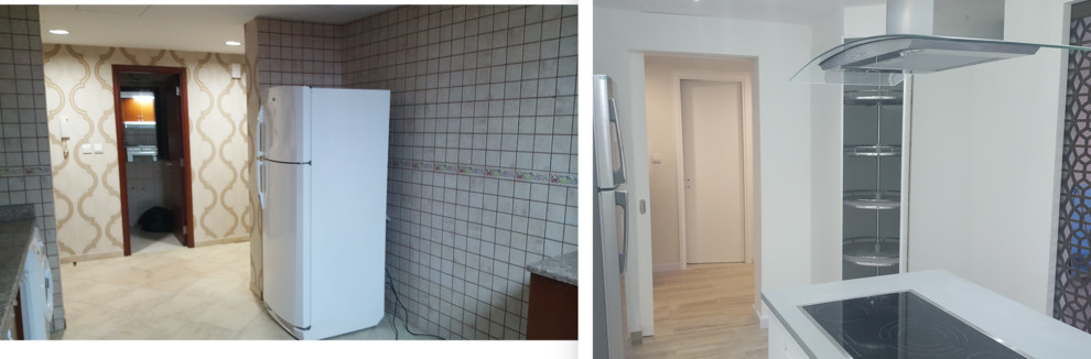 Large minimalist l-shaped ceramic tile kitchen pantry photo with an integrated sink, flat-panel cabinets, white cabinets, ceramic backsplash, black appliances and an island