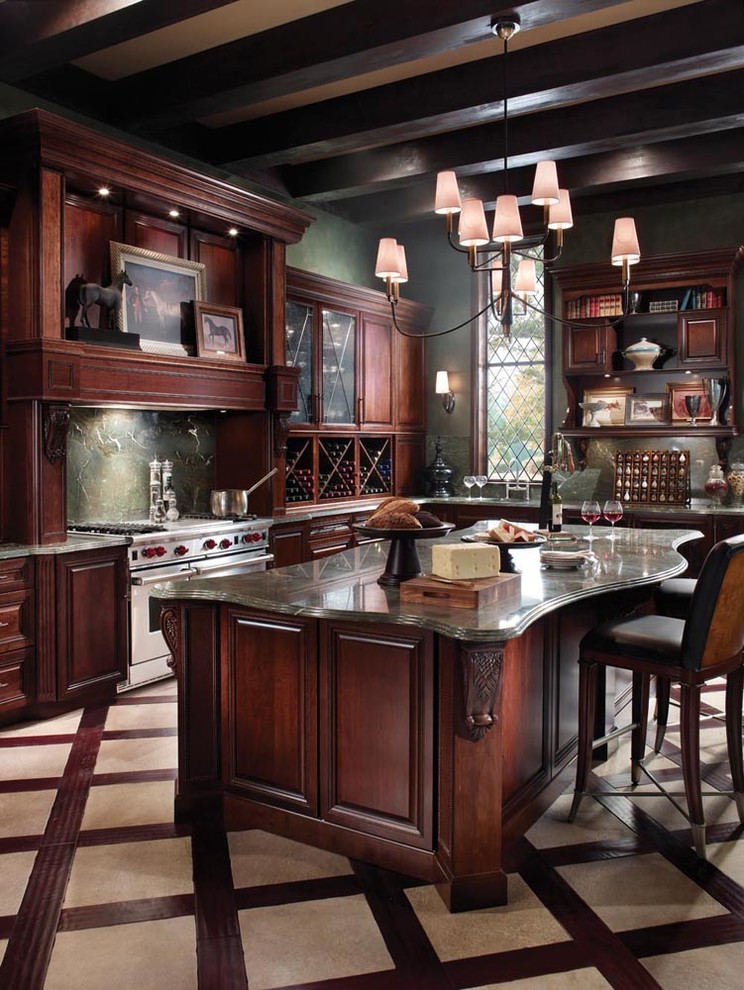 Design ideas for a traditional kitchen in Detroit with raised-panel cabinets, dark wood cabinets, granite benchtops, green splashback, stainless steel appliances, ceramic floors and with island.