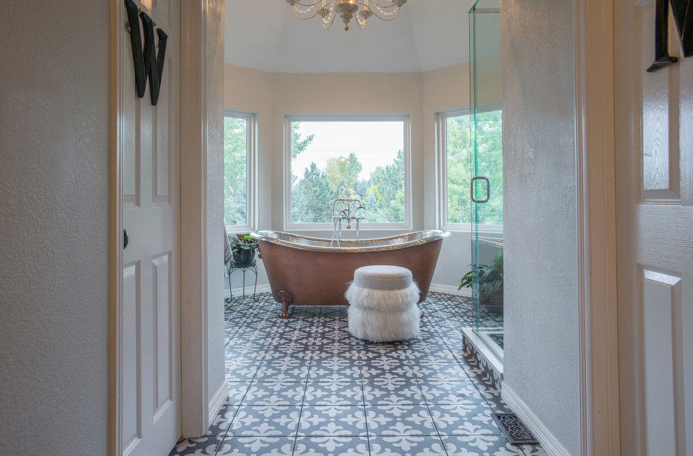 Inspiration for a large contemporary master bathroom in Denver with flat-panel cabinets, white cabinets, a claw-foot tub, an alcove shower, a one-piece toilet, white walls, ceramic floors, a console sink, green floor and a hinged shower door.