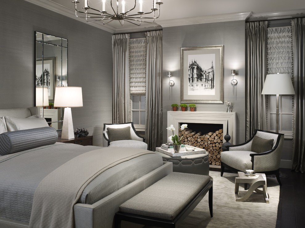 Inspiration for a transitional bedroom in Chicago with grey walls and a standard fireplace.