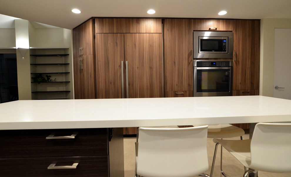 This is an example of a small modern l-shaped separate kitchen in Other with an undermount sink, flat-panel cabinets, white cabinets, quartz benchtops, grey splashback, porcelain splashback, stainless steel appliances, porcelain floors and with island.