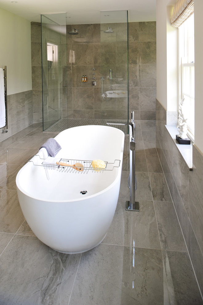 Photo of a contemporary bathroom in Berkshire with brown tile, porcelain tile, porcelain floors and brown floor.