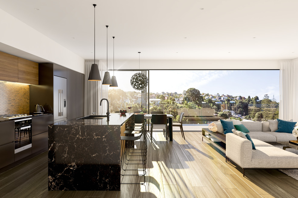 Design ideas for a mid-sized contemporary galley open plan kitchen in Auckland with a double-bowl sink, black cabinets, quartz benchtops, metallic splashback, metal splashback, stainless steel appliances, light hardwood floors and with island.