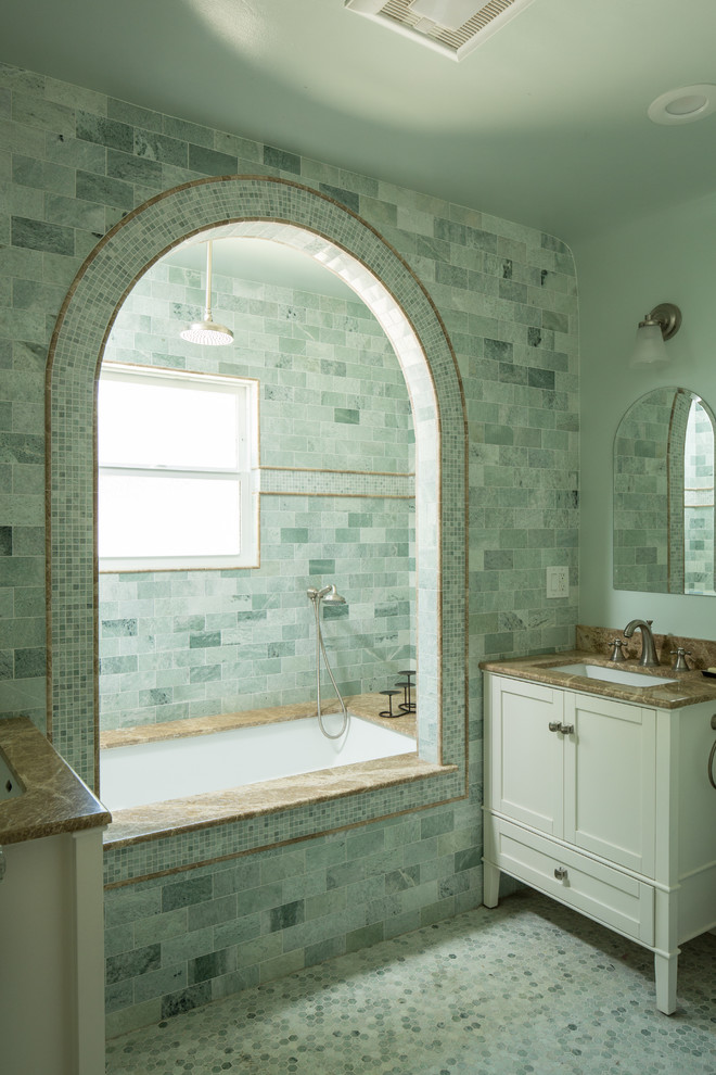 Design ideas for a mid-sized mediterranean master bathroom in Los Angeles with an undermount sink, shaker cabinets, white cabinets, granite benchtops, an undermount tub, an alcove shower, green tile, stone tile, green walls, mosaic tile floors and green floor.