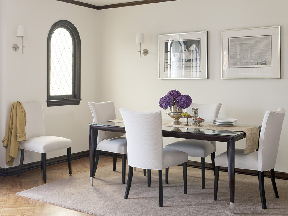 Traditional dining room in San Francisco with white walls and dark hardwood floors.