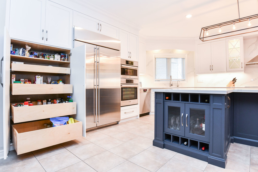 Example of a transitional kitchen design in Toronto