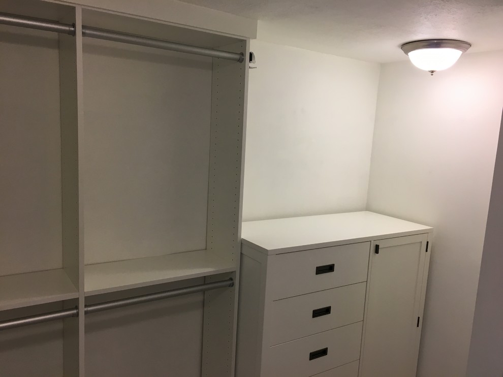 Design ideas for a small contemporary men's walk-in wardrobe in Miami with shaker cabinets, white cabinets and porcelain floors.