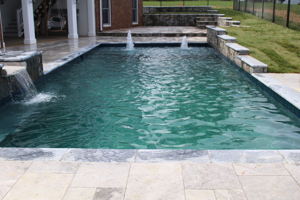 Inspiration for a small rustic backyard stone and rectangular natural hot tub remodel in DC Metro