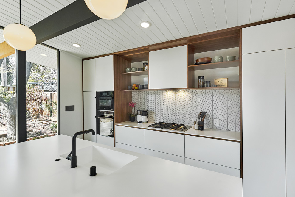 Design ideas for a contemporary kitchen in San Francisco with an integrated sink and linoleum floors.