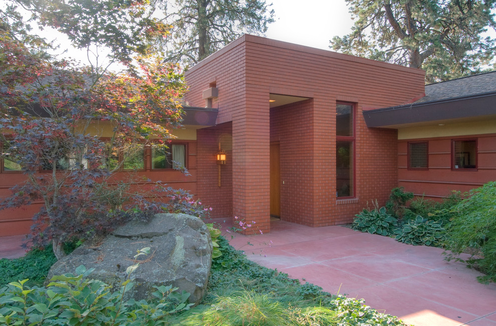 Inspiration for a modern brick exterior in Seattle.