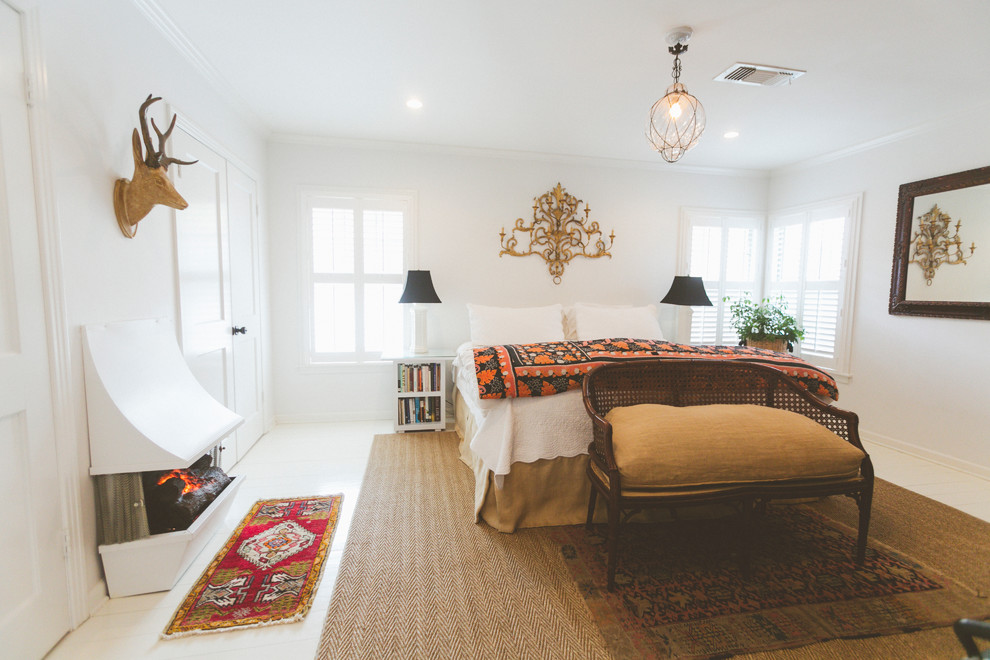 This is an example of an eclectic bedroom in Austin.