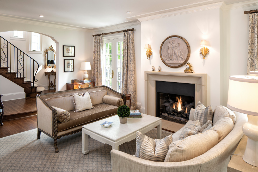 This is an example of a mediterranean enclosed living room in Minneapolis with white walls, dark hardwood floors and brown floor.