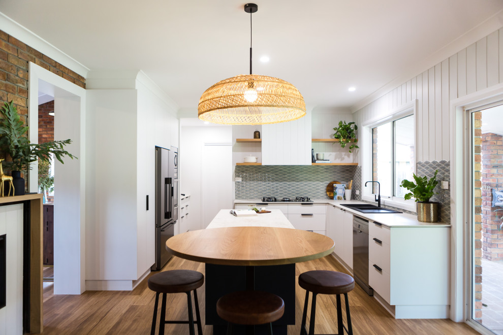 Beach style kitchen in Wollongong.