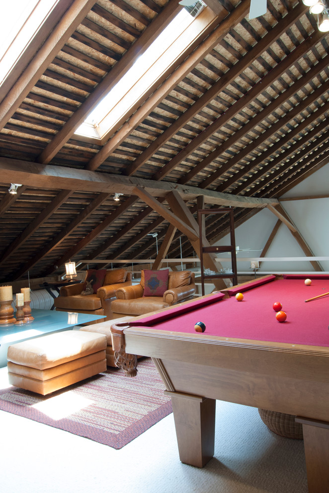 Inspiration for a large country loft-style family room in Other with a game room and carpet.