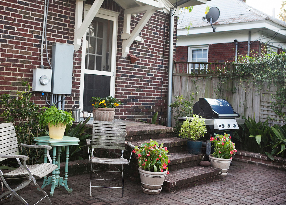 Design ideas for a mid-sized eclectic backyard shaded garden in Atlanta.