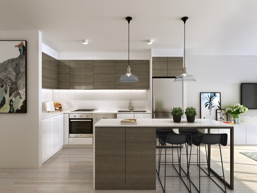 Small contemporary l-shaped eat-in kitchen in Brisbane with an undermount sink, medium wood cabinets, solid surface benchtops, white splashback, ceramic splashback, stainless steel appliances, light hardwood floors, with island and flat-panel cabinets.
