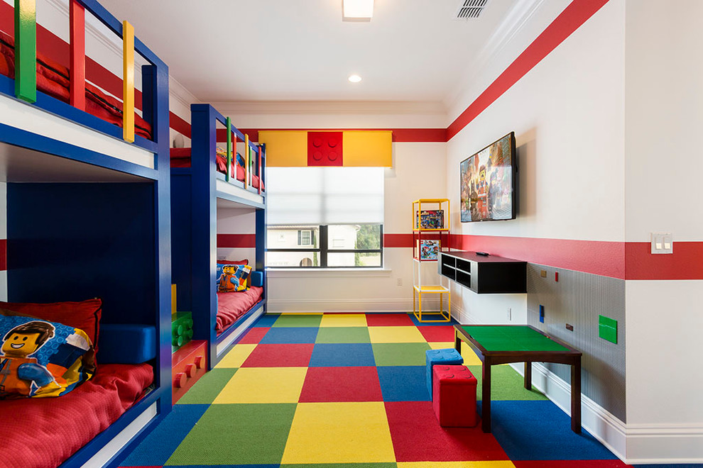 Transitional gender-neutral kids' playroom in Orlando with carpet, multi-coloured walls and multi-coloured floor for kids 4-10 years old.