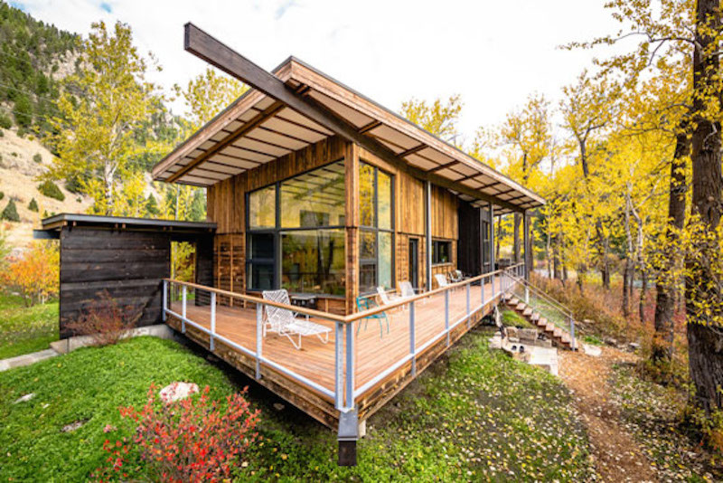 Deck - contemporary side yard balcony deck idea with a roof extension