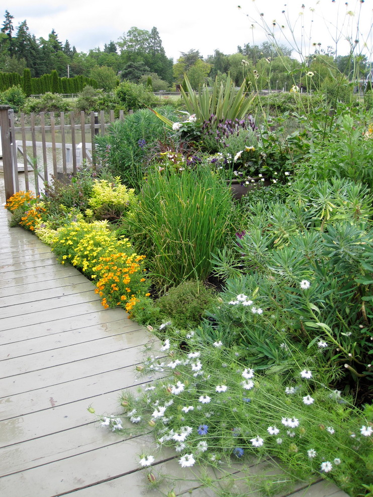 Design ideas for a traditional garden for summer in Vancouver with decking.