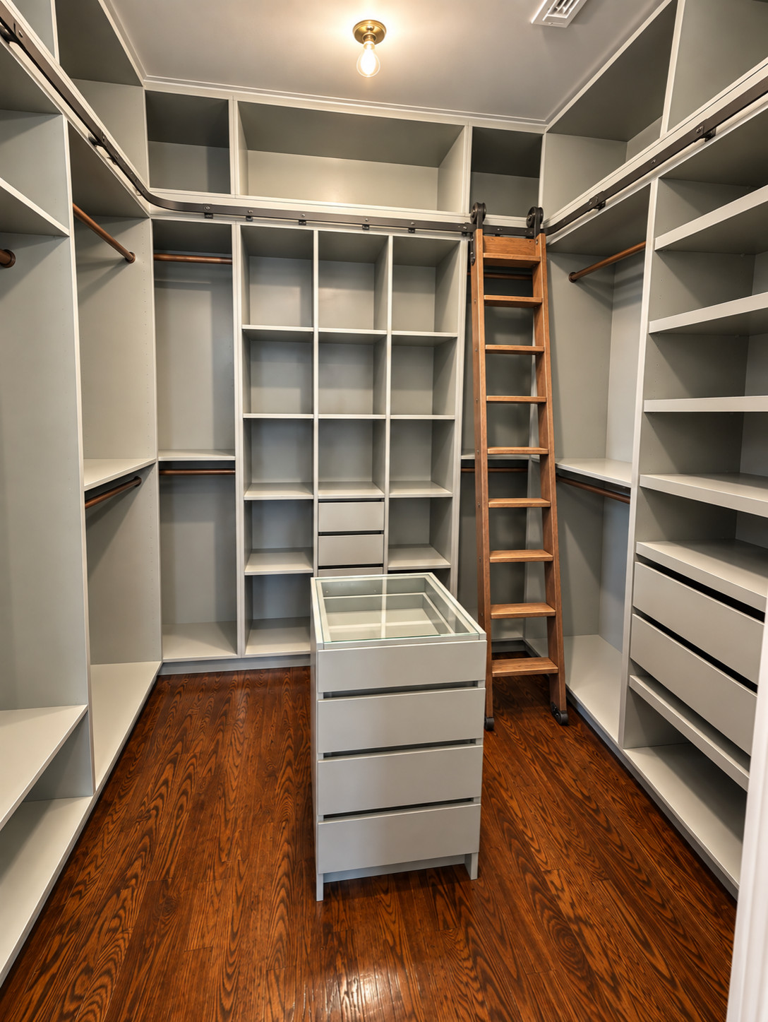 Custom Walk-In Closet with Built-In Storage & Glass-Top Island