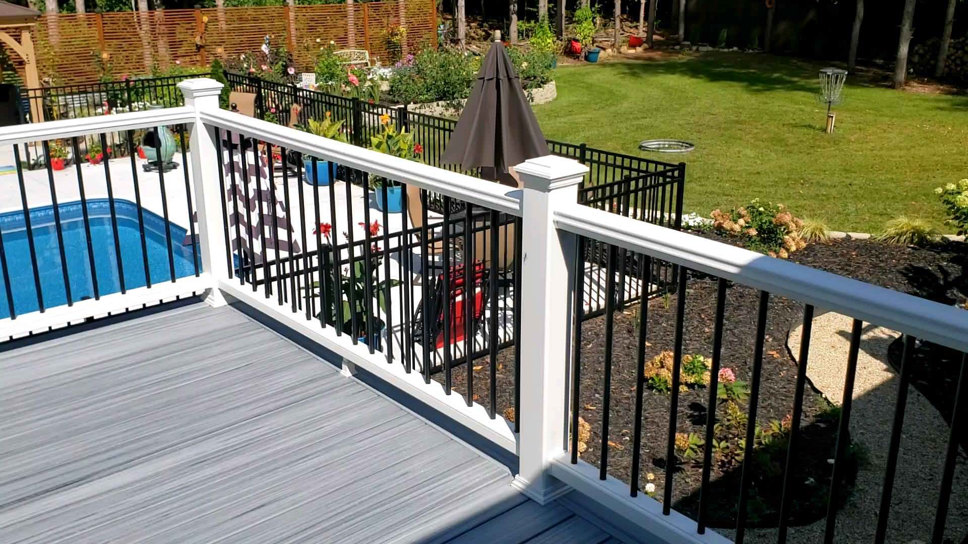 We built a new deck with Timbertech decking, and Trex handrail for the client to help put the finishing touches on their awesome backyard oasis!