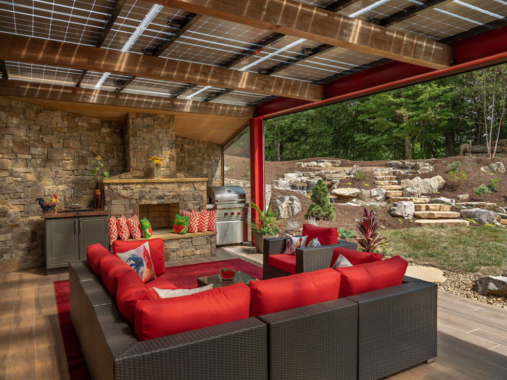 Large contemporary backyard patio in Other with tile and a pergola.