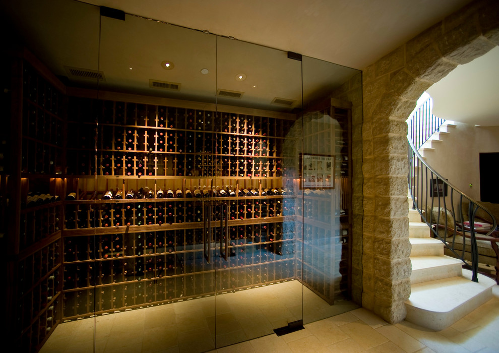 Photo of a large country wine cellar in San Francisco with travertine floors, storage racks and beige floor.