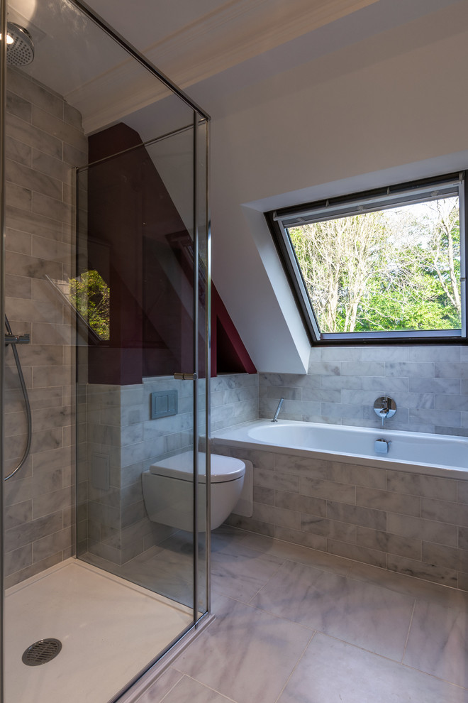 Design ideas for a mid-sized contemporary kids bathroom in Sussex with flat-panel cabinets, white cabinets, a drop-in tub, a corner shower, a one-piece toilet, white tile, marble, red walls, marble floors, a console sink, white floor and a hinged shower door.
