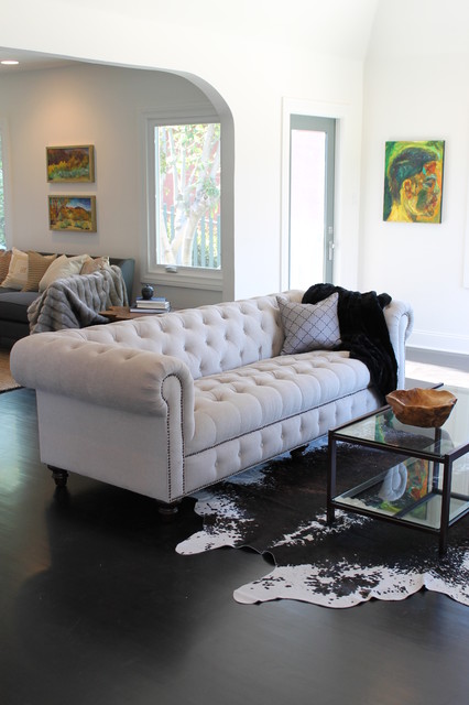 Cowhide Rug And Linen Chesterfield Sofa Eclectic Living Room