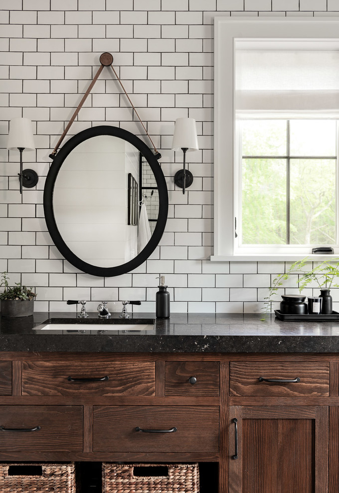 Photo of a large country master bathroom in New York with flat-panel cabinets, brown cabinets, white tile, subway tile, white walls, slate floors, an undermount sink, concrete benchtops, black floor and black benchtops.